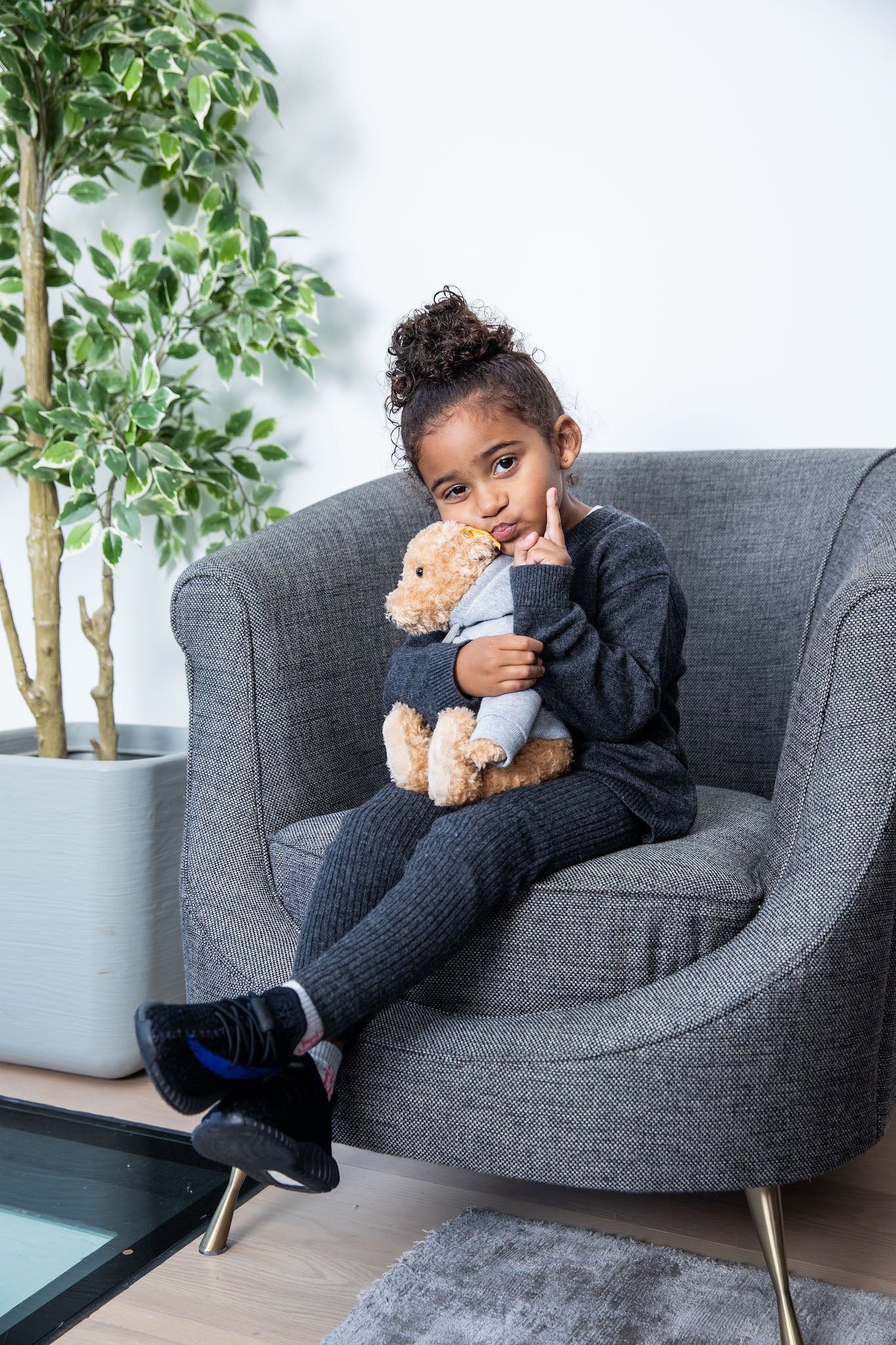 girl wearing adidas Yeezy Boost 350 V2 Kids 'Dazzling Blue' on foot