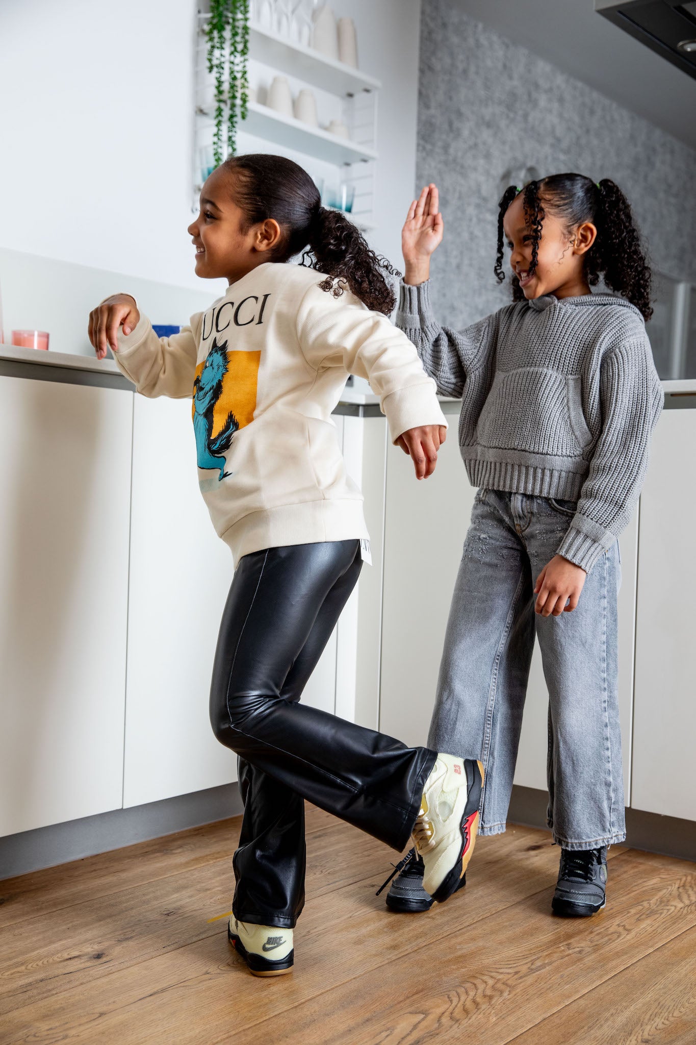 girl wearing Air Jordan 5 x Off-White Kids 'Sail' on foot