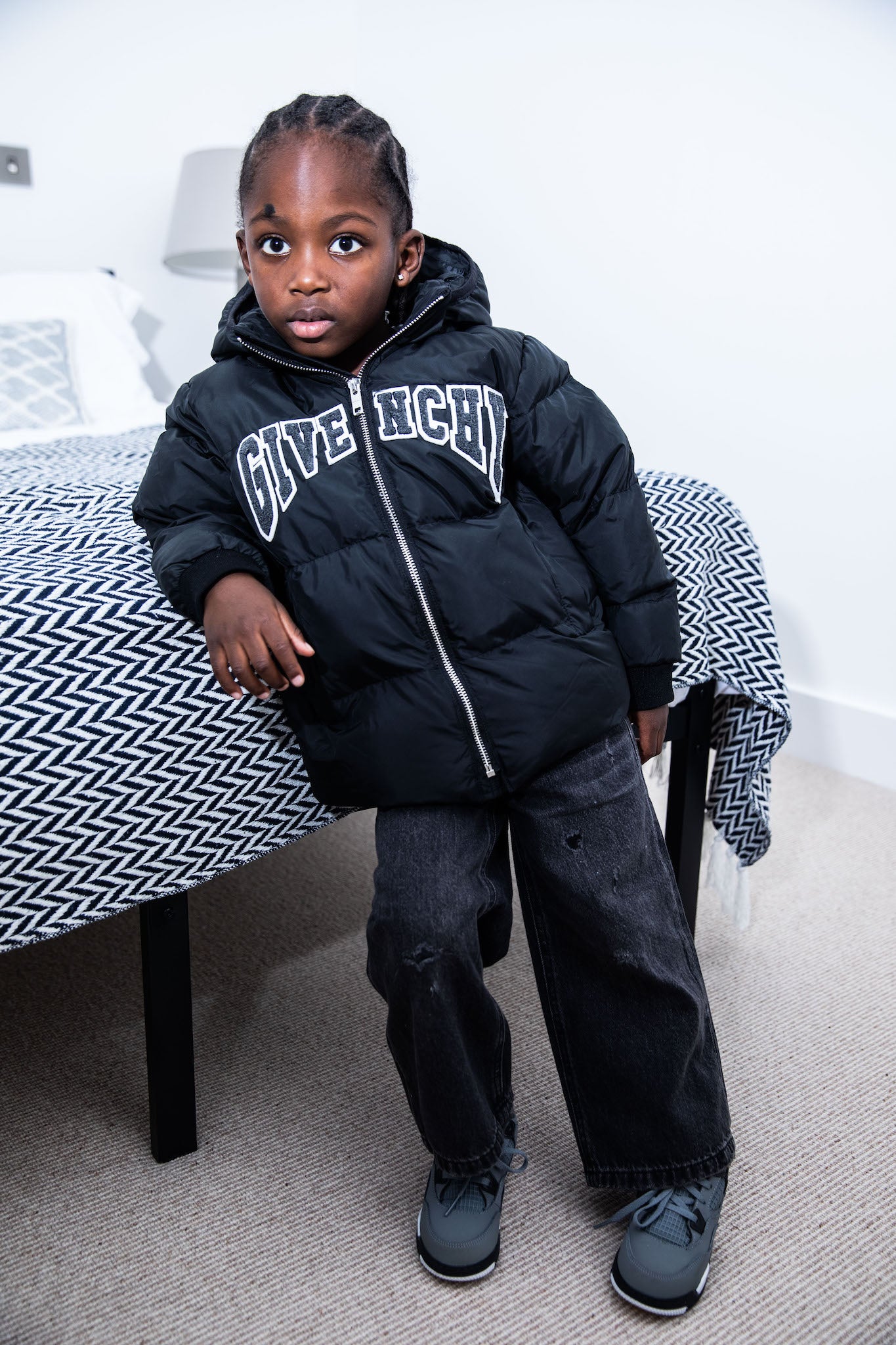 kid wearing Air Jordan 4 Kids 'Cool Grey' on foot