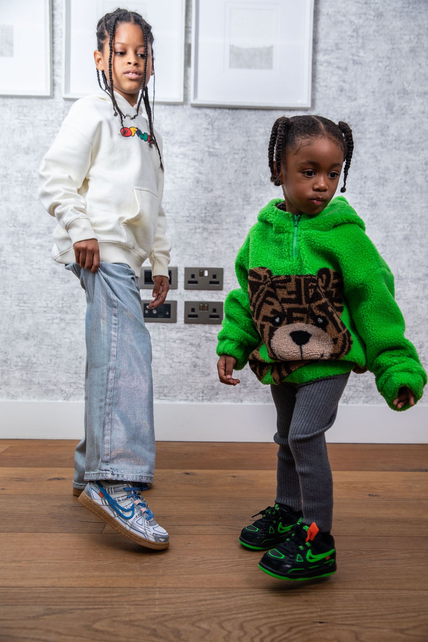 little girl wearing nike rubber dunk low off white green strike on foot