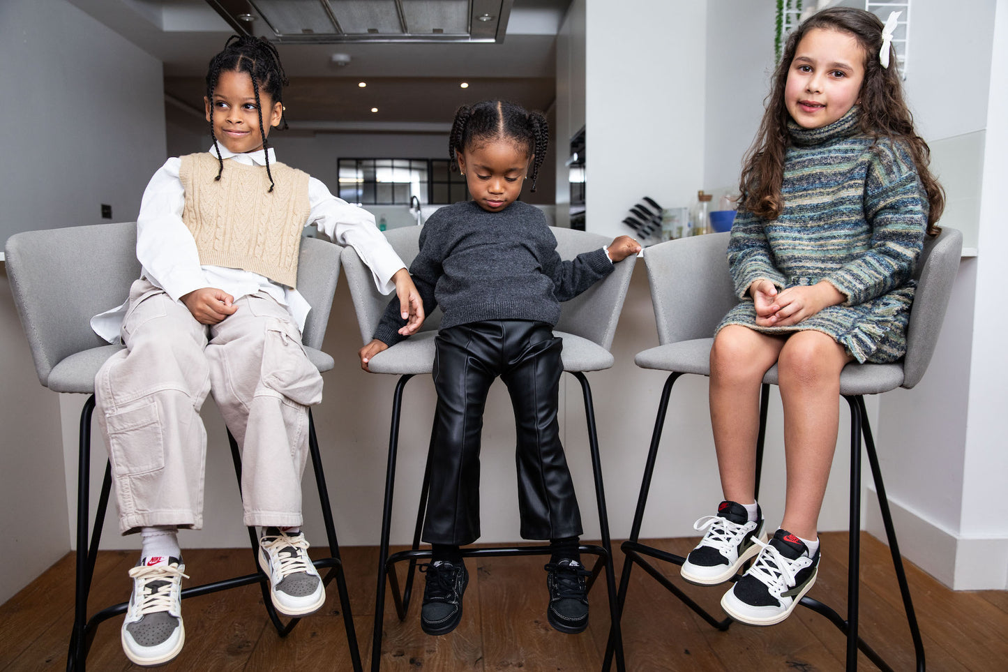 kids wearing air jordan 1 low travis scott olive on foot