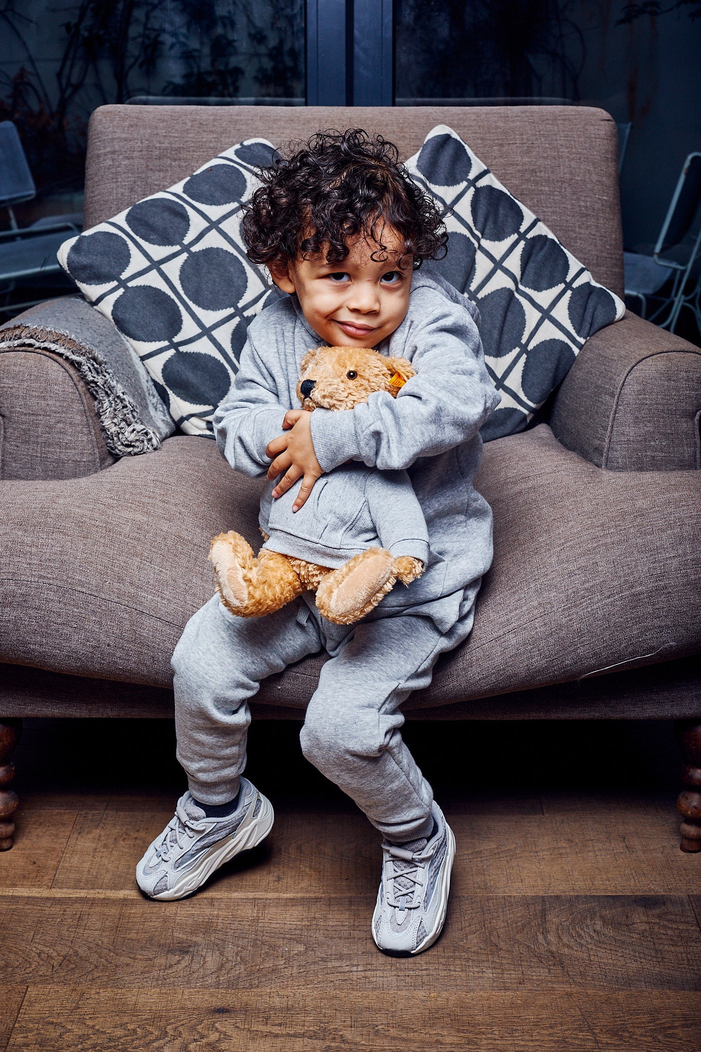little boy wearing Adidas Yeezy Boost 700 V2 Kids 'Static'