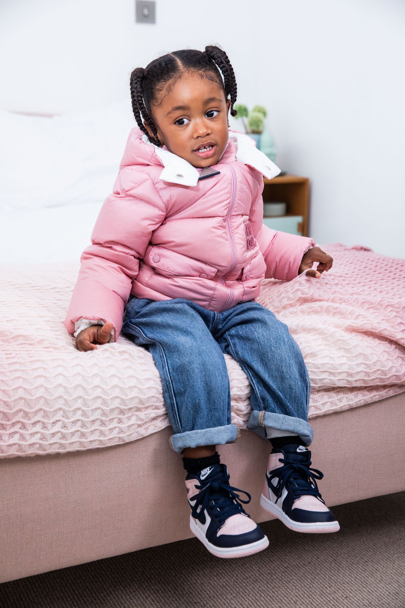 little girl wearing Air Jordan 1 High Kids 'Atmosphere' on foot