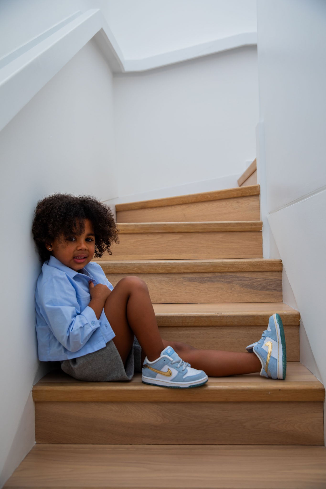 little girl wearing Nike SB Dunk Low Kids 'Sean Cliver' on foot