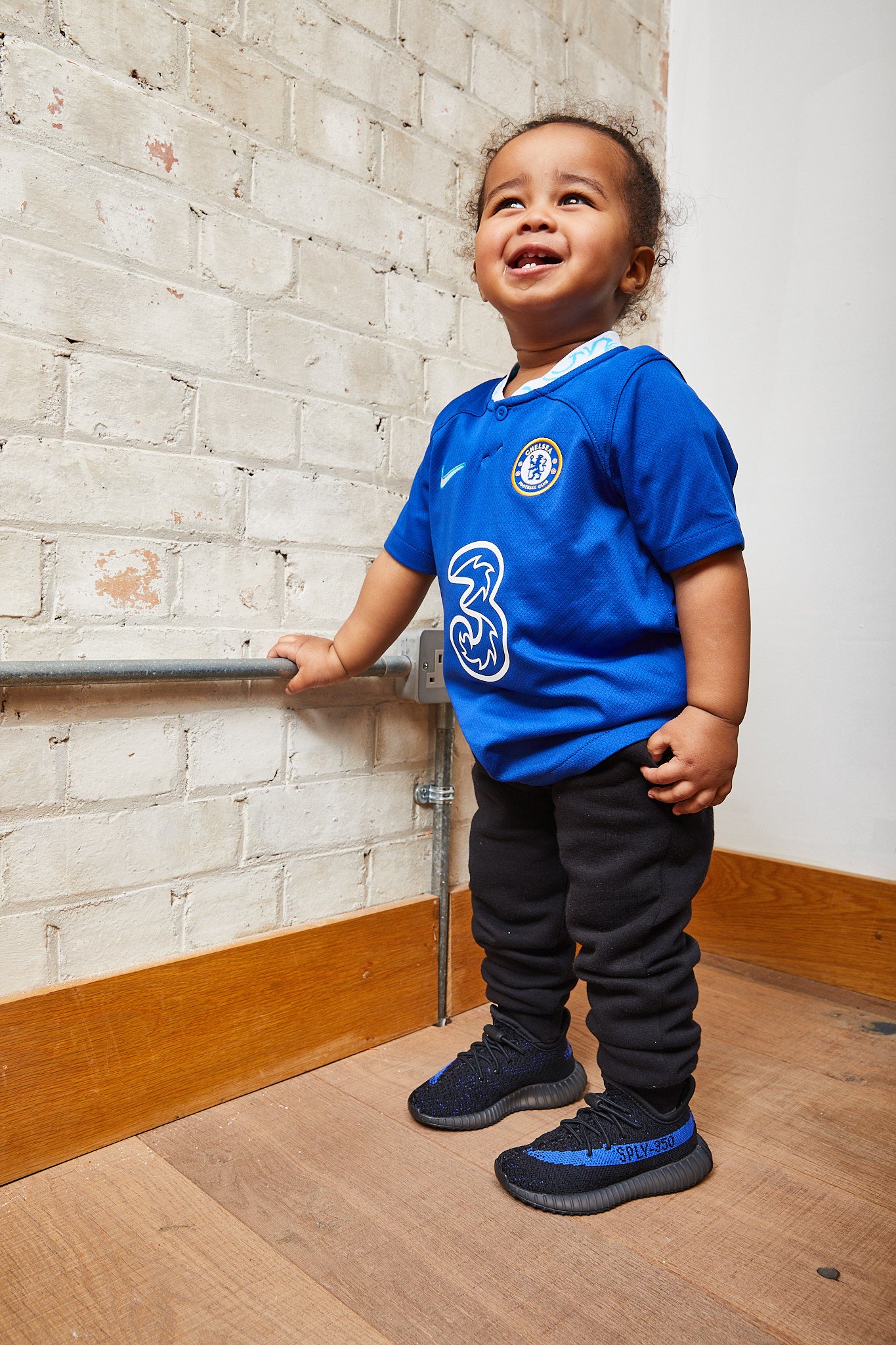 KID WEARING Adidas Yeezy Boost 350 V2 Kids 'Dazzling Blue'