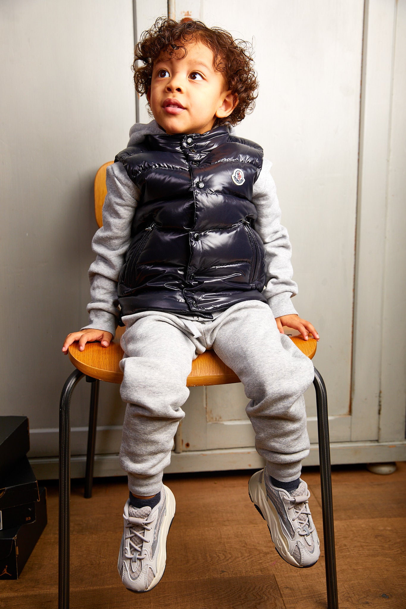 little boy wearing Adidas Yeezy Boost 700 V2 Kids 'Static'