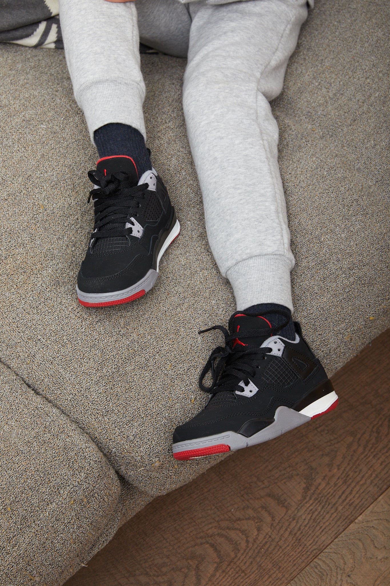 Air Jordan 4 Kids 'Bred' on foot